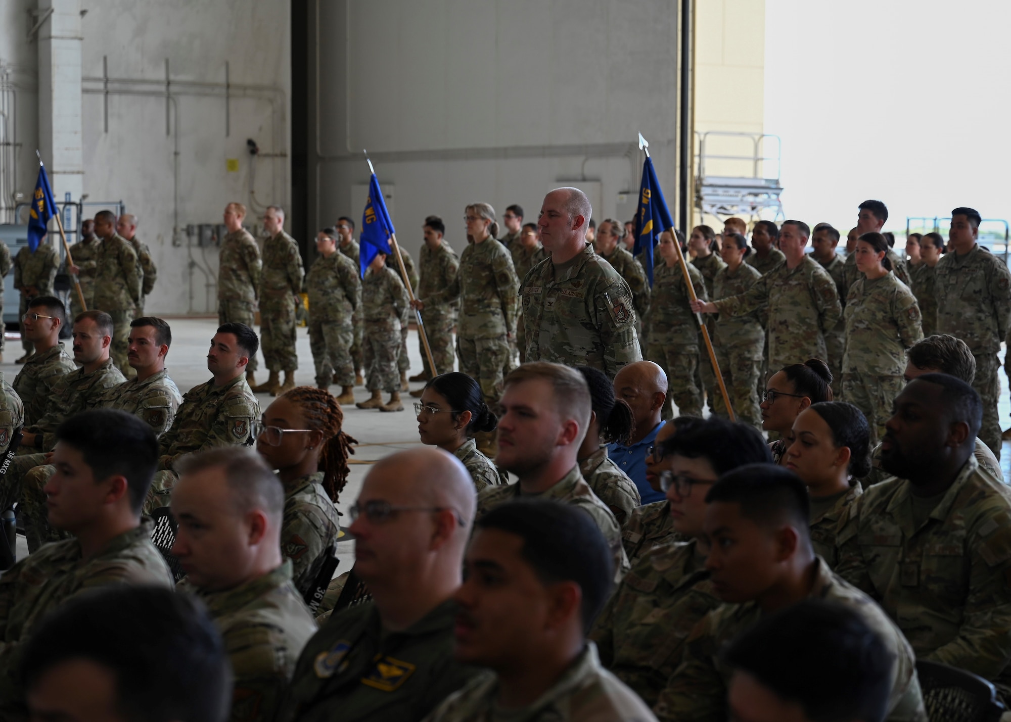 U.S. Air Force Col. Brandon Shroyer, 36th Wing Deputy Commander, leads the formation during the 36th Wing change of command ceremony at Andersen Air Force Base, Guam, May 22, 2025. The formation is a combination of Airmen from different squadrons from the 36th Wing. (U.S. Air Force photo by Airman 1st Class Joseph Maye)