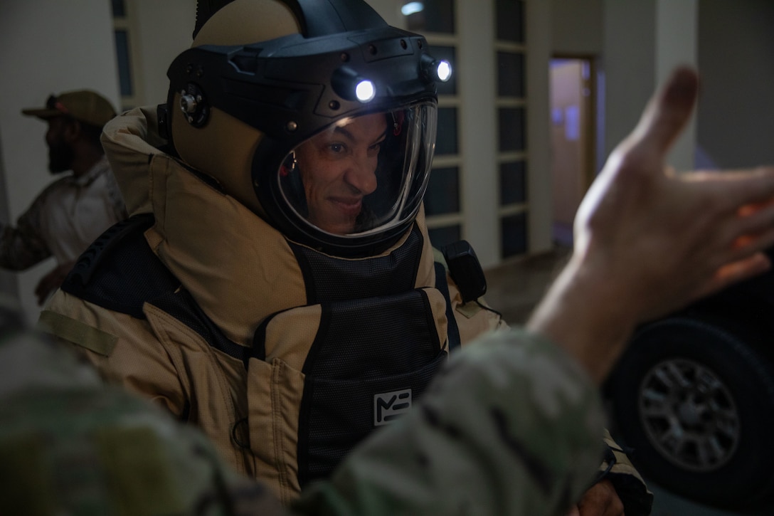 A U.S. Sailor conducts a functions check on the EOD 10E bomb suit during exercise Nautical Defender (ND) 25 in Jubail, Kingdom of Saudi Arabia. ND 25 is the capstone in a series of multi-national maritime security exercises designed to broaden levels of cooperation, support long-term regional security, and enhance military-to-military interoperability between the Kingdom of Saudi Arabia and the U.S.