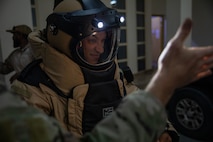 A U.S. Sailor conducts a functions check on the EOD 10E bomb suit during exercise Nautical Defender (ND) 25 in Jubail, Kingdom of Saudi Arabia. ND 25 is the capstone in a series of multi-national maritime security exercises designed to broaden levels of cooperation, support long-term regional security, and enhance military-to-military interoperability between the Kingdom of Saudi Arabia and the U.S.