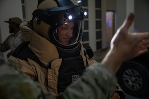 A U.S. Sailor conducts a functions check on the EOD 10E bomb suit during exercise Nautical Defender (ND) 25 in Jubail, Kingdom of Saudi Arabia. ND 25 is the capstone in a series of multi-national maritime security exercises designed to broaden levels of cooperation, support long-term regional security, and enhance military-to-military interoperability between the Kingdom of Saudi Arabia and the U.S.