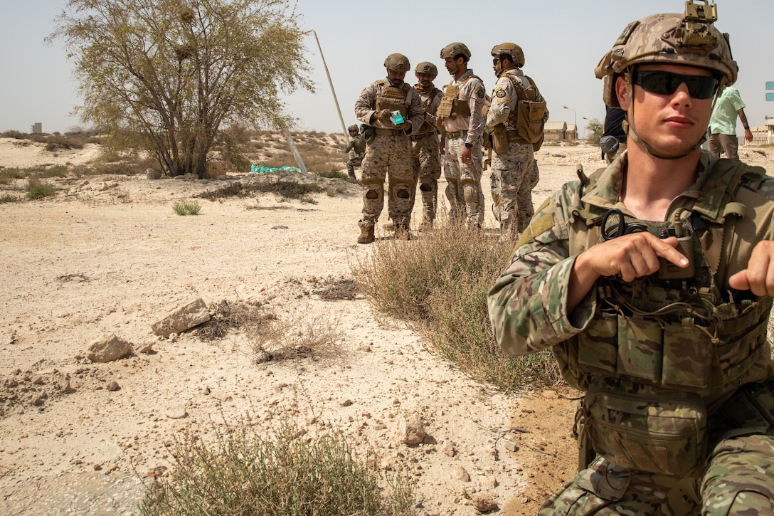 A U.S. Sailor provides security to members of the Royal Saudi Naval Forces for land improvised explosive devise response training during exercise Nautical Defender (ND) 25 in Jubail, Kingdom of Saudi Arabia. ND 25 is the capstone in a series of multi-national maritime security exercises designed to broaden levels of cooperation, support long-term regional security, and enhance military-to-military interoperability between the Kingdom of Saudi Arabia and the U.S.