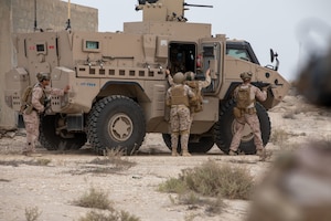 U.S. Marines form a tactical position for a field exercise training during exercise Nautical Defender (ND) 25 in Jubail, Kingdom of Saudi Arabia. ND 25 is the capstone in a series of multi-national maritime security exercises designed to broaden levels of cooperation, support long-term regional security, and enhance military-to-military interoperability between the Kingdom of Saudi Arabia and the U.S.