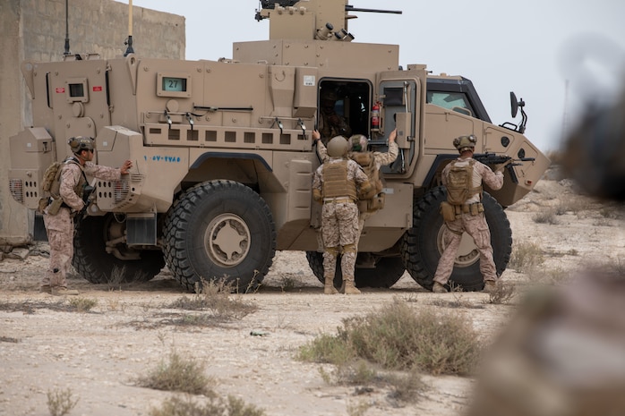 U.S. Marines form a tactical position for a field exercise training during exercise Nautical Defender (ND) 25 in Jubail, Kingdom of Saudi Arabia. ND 25 is the capstone in a series of multi-national maritime security exercises designed to broaden levels of cooperation, support long-term regional security, and enhance military-to-military interoperability between the Kingdom of Saudi Arabia and the U.S.