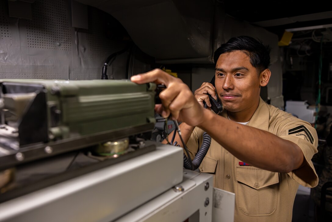 U.S. Marine Corps Cpl. Misael Hernandez, a transmissions systems operator with 2nd Combat Readiness Regiment, 2nd Marine Logistics Group, and native of Newport News, Virginia, poses for a photo aboard the San-Antonio Class amphibious transport dock USS New York (LPD 21) in New York, May 21, 2025. Hernandez was selected as warrior of the week for his tenacious work ethic while attached to Special Purpose Marine Air-Ground Task Force - Fleet Week New York. While aboard the USS New York, Hernandez acted as transmissions chief, setting up vital lines of communication between different ships and providing uninterrupted communications that ensured the command stayed connected via two separate radio nets. While on ship he was directly responsible for managing workflow and scheduling shifts for eight Marines under his charge. Each week, 2nd MLG recognizes one outstanding Marine or Sailor that goes above and beyond in their duties and embodies the qualities of an outstanding service member. (U.S. Marine Corps Photo by Cpl. Christian Salazar)