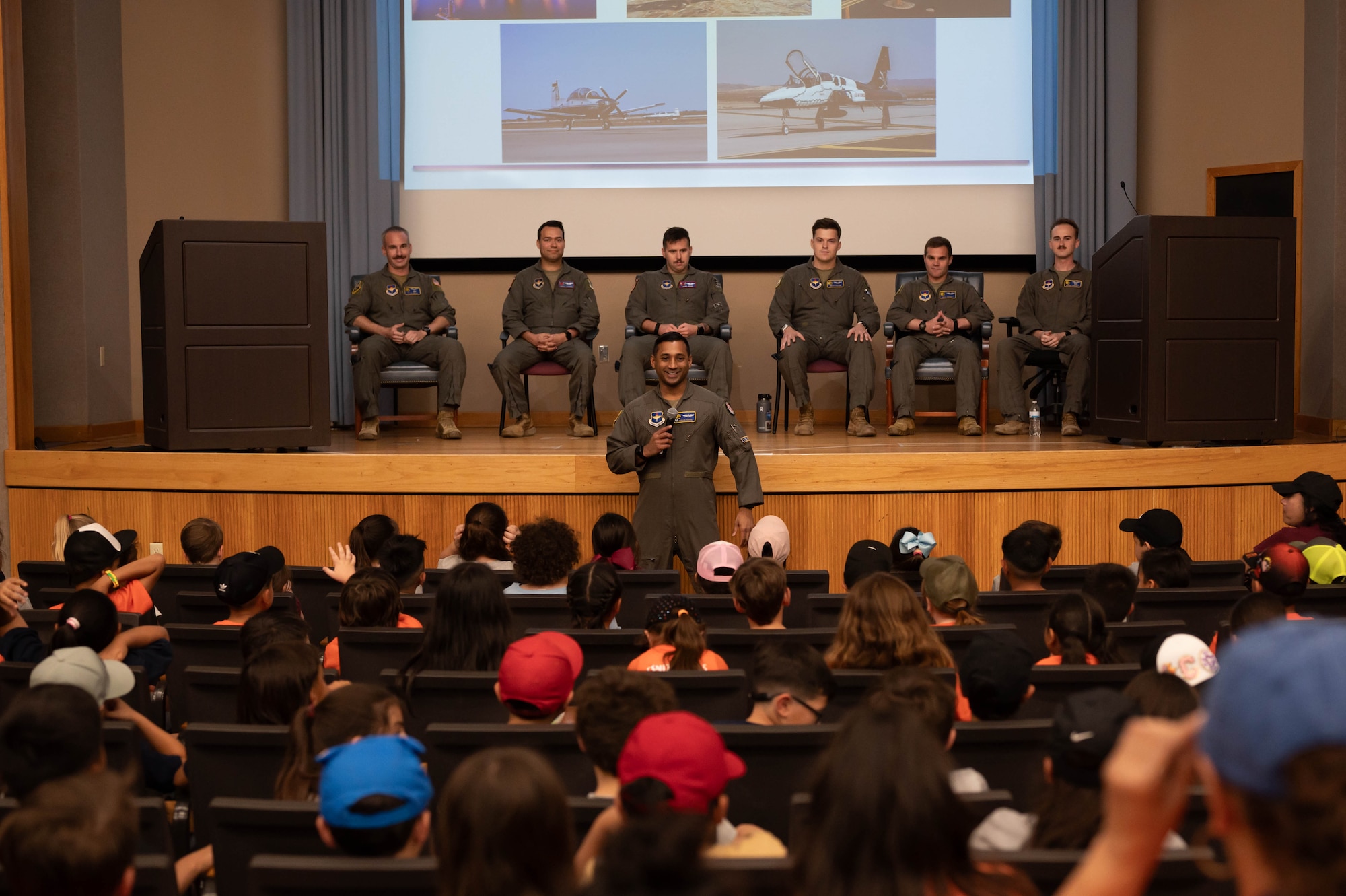 U.S. Air Force instructor pilots from the 85th Flying Training Squadron (FTS) and 87th FTS, speak to students during a Ceniza Hills School tour at Laughlin Air Force Base, Texas, May 15, 2025. The panel was part of Police Week events designed to inspire and educate local youth. (U.S. Air Force photo by Senior Airman Keira Rossman)