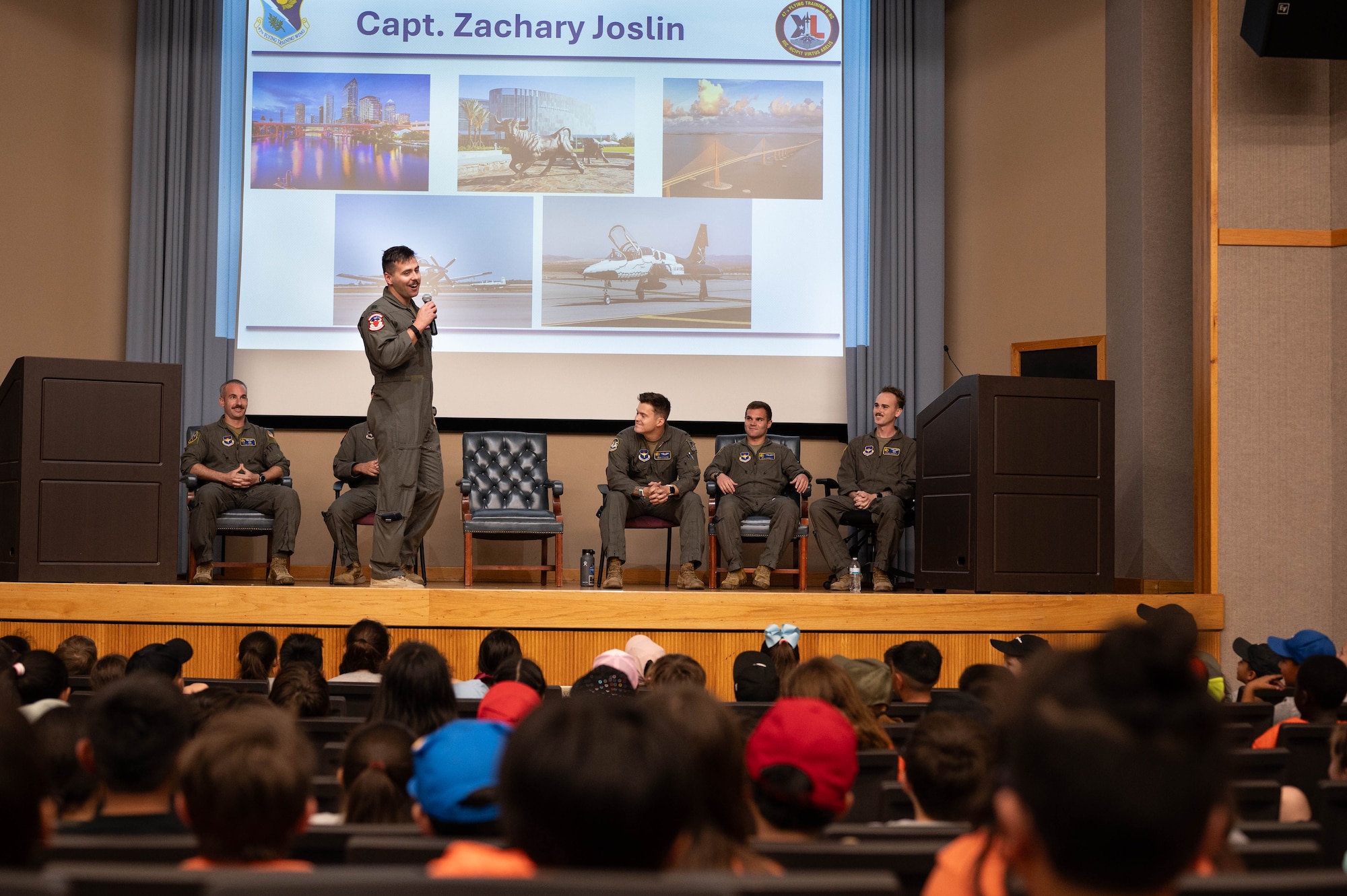 U.S. Air Force Capt. Zachary Joslin, 87th Flying Training Squadron instructor pilot, shares his Air Force journey with local students during a Ceniza Hills School tour at Laughlin Air Force Base, Texas, May 15, 2025. The presentation offered insights into military aviation and pilot training. (U.S. Air Force photo by Senior Airman Keira Rossman)