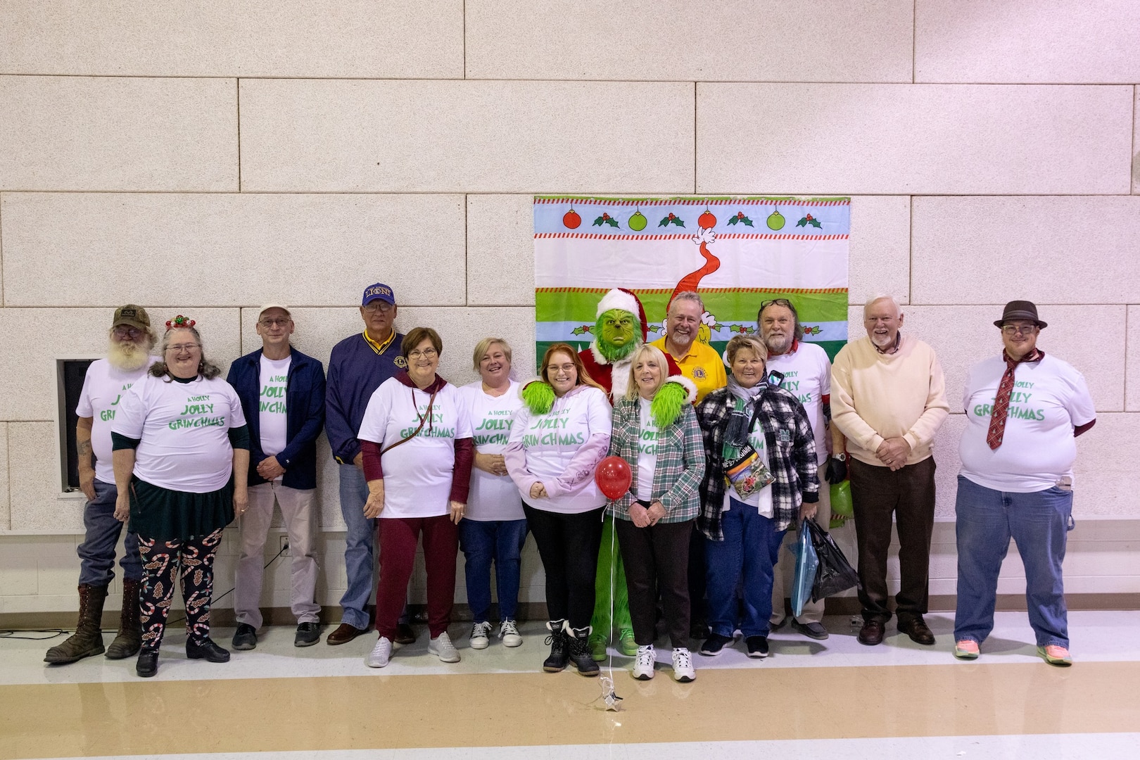 group photos of Family Program staff and volunteers at various events
