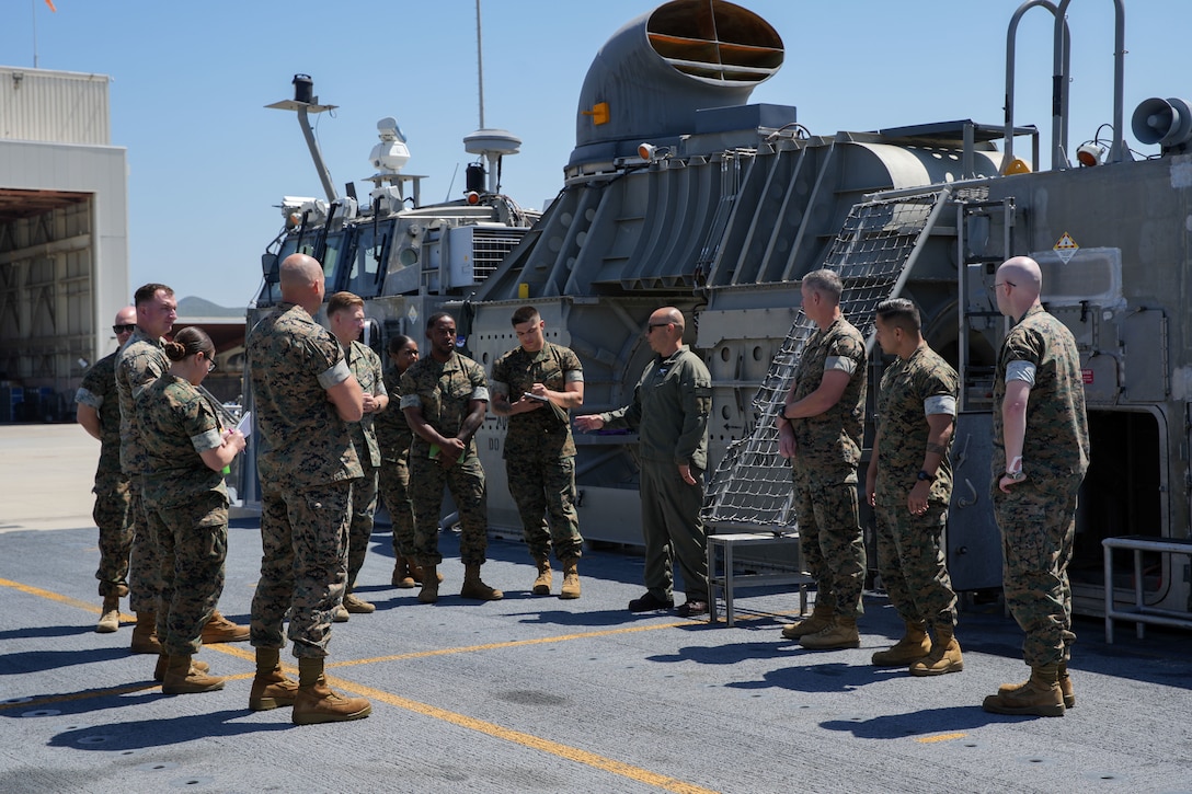 U.S. Marines with the 11th Marine Expeditionary Unit, I Marine Expeditionary Force, receive instructions on landing craft, air cushions (LCAC) operations, at Marine Corps Base Camp Pendleton, California, May 19, 2025.