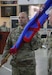 U.S. Army Lt. Col. Stephen Strack, incoming battalion commander, holds the unit guidon after it was passed to him signifying the exchange of command during the Recruiting and Retention Battalion’s change of command ceremony at Wellman Armory on Boone National Guard Center in Frankfort May 20, 2025.