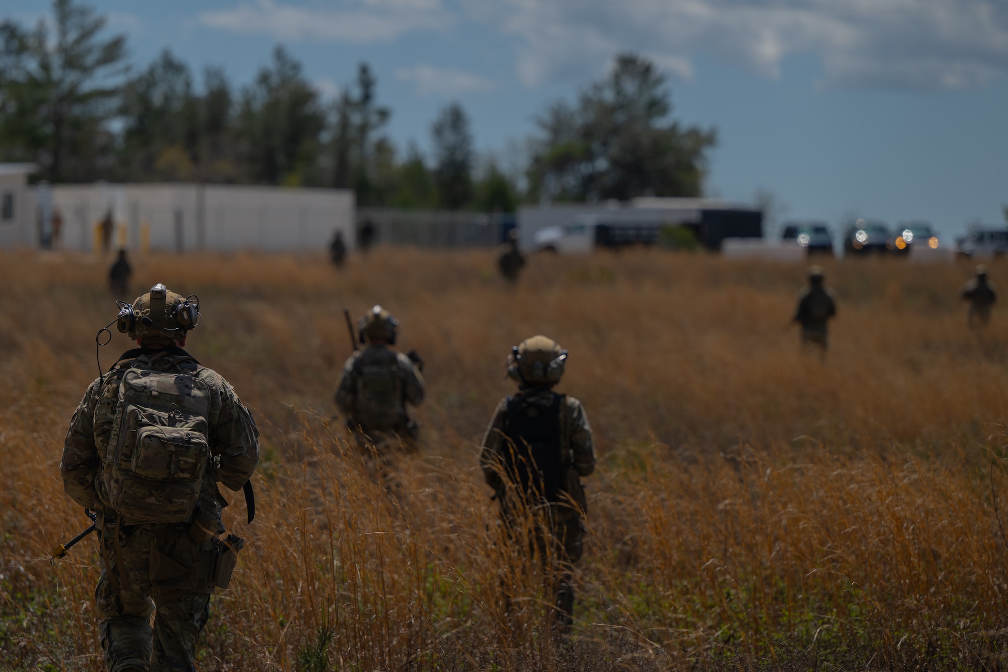 U.S. Airmen assigned to the 1st Special Operations Wing patrol an area during a joint unit base exercise near Hurlburt Field, Florida, March 25, 2025.