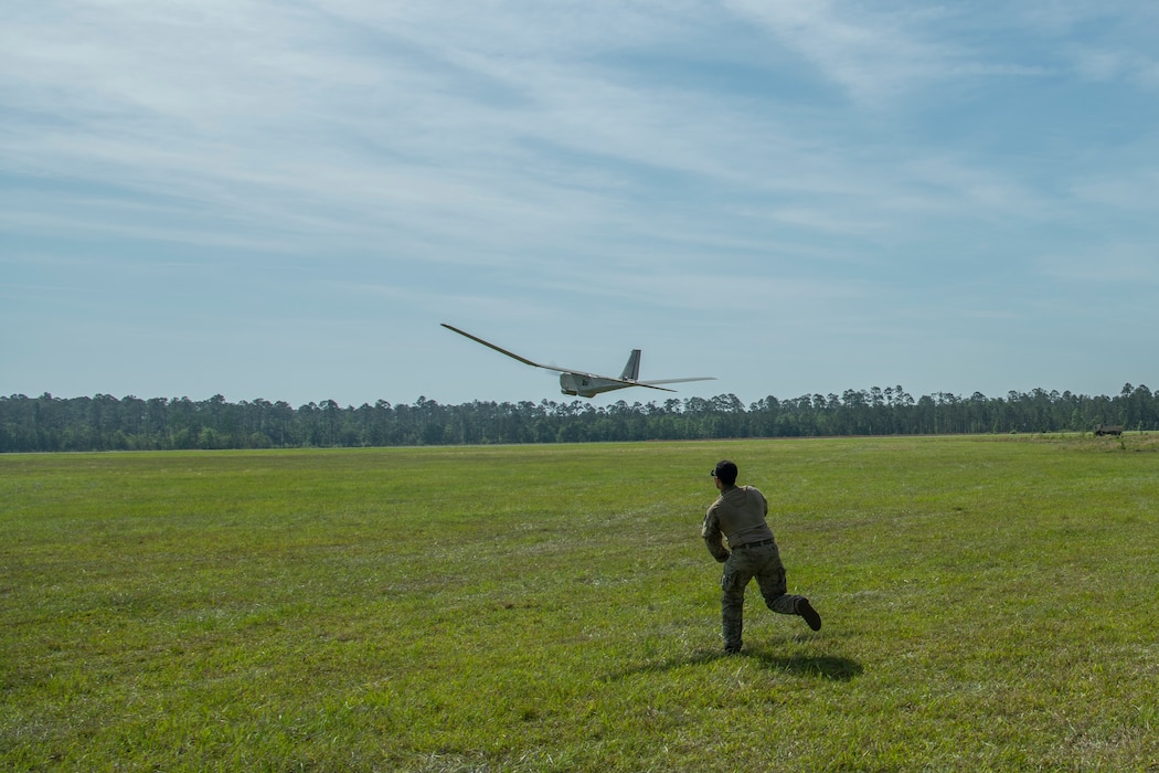 Airman launches a drone