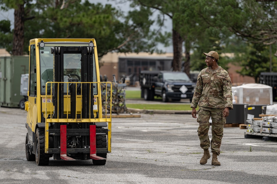 A forklift offloads cargo.