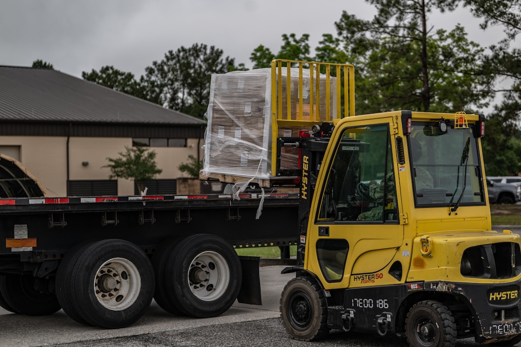 A forklift offloads cargo.