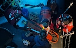 The crew of U.S. Coast Guard Cutter John McCormick medevacs an injured fisherman Oct. 15, 2022, off Vancouver Island, British Columbia, Canada. The John McCormick crew placed the patient in the care of the Canadian Coast Guard Patrol Vessel M. Charles M.B. crew, who brought him to EMS in Port McNeill. (U.S. Coast Guard photo)