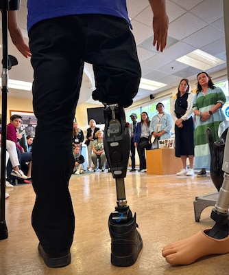 250516-N-WJ173-1004 SAN DIEGO (May 16, 2025) – Nathaniel Leoncino, lead prosthetist at Naval Medical Center San Diego’s (NMCSD) Comprehensive Combat and Complex Casualty Care (C5) facility, briefs Foreign Defense Attaché spouses during their visit as part of the Spring 2025 Foreign Defense Attaché Orientation Program, hosted by the Defense Intelligence Agency, May 16, 2025. In the foreground, Leoncino’s own prosthetic limb is displayed, underscoring the personal and professional dedication he brings to rehabilitative care. The mission of NMCSD is to provide a superior experience for our patients, staff, and warfighters. NMCSD employs more than 5,000 active-duty military personnel, civilians, and contractors in Southern California to deliver exceptional care afloat and ashore.