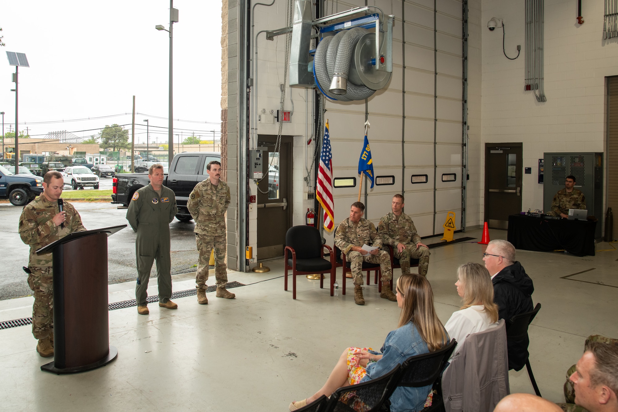 U.S. Air Force Master Sgt. William Reed, 177th Logistics Readiness Squadron first sergeant, gives the award citation and accompanying narrative read aloud during a Bronze Star Medal and Casing of the Colors Ceremony at the 177th Fighter Wing, Egg Harbor Township, New Jersey, May 4, 2025. The Bronze Star is awarded to service members who distinguish themselves by heroic or meritorious achievement or service in a combat zone. The Casing of the Colors Ceremony marks a transition of a unit, whether that be inactivation, relocation, or deployment.