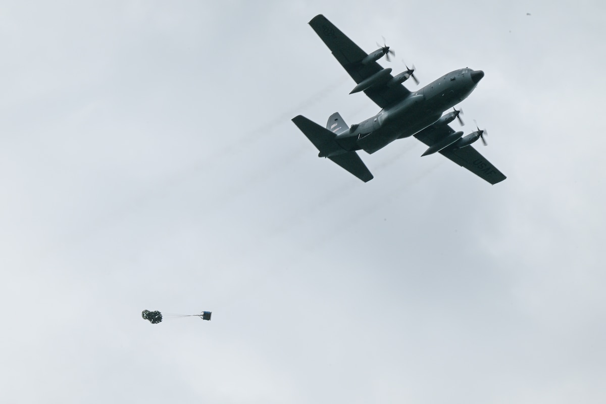A 910th Airlift Wing C-130H Hercules aircraft drops a container delivery system bundle at Camp James A. Garfield Joint Military Training Center, Ohio, May 15, 2025.