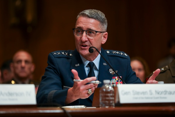 Gen. Nordhaus speaks into a microphone while testifying before members of the Senate Appropriations Committee Subcommittee on Defense off camera.