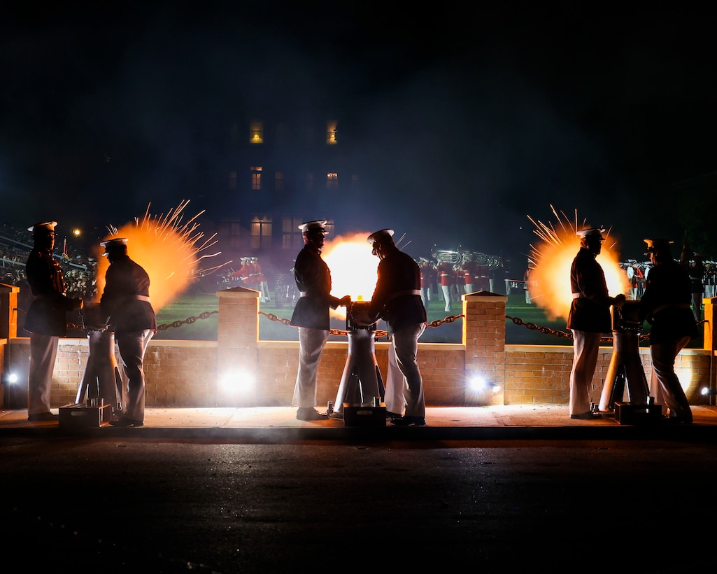U.S. Marine Corps Body Bearers fire ceremonial cannons during the conclusion of a Friday Evening Parade at Marine Barracks Washington, D.C., May 16, 2025. The hosting official for the event was Lt. Gen. Michael J. Borgschulte, Deputy Commandant for Manpower and Reserve Affairs. The guest of honor was U.S. Representative Mike Bost of Illinois. The final cannon salute signifies the end of the parade, honoring the Marine Corps' traditions of precision, professionalism, and ceremonial excellence.