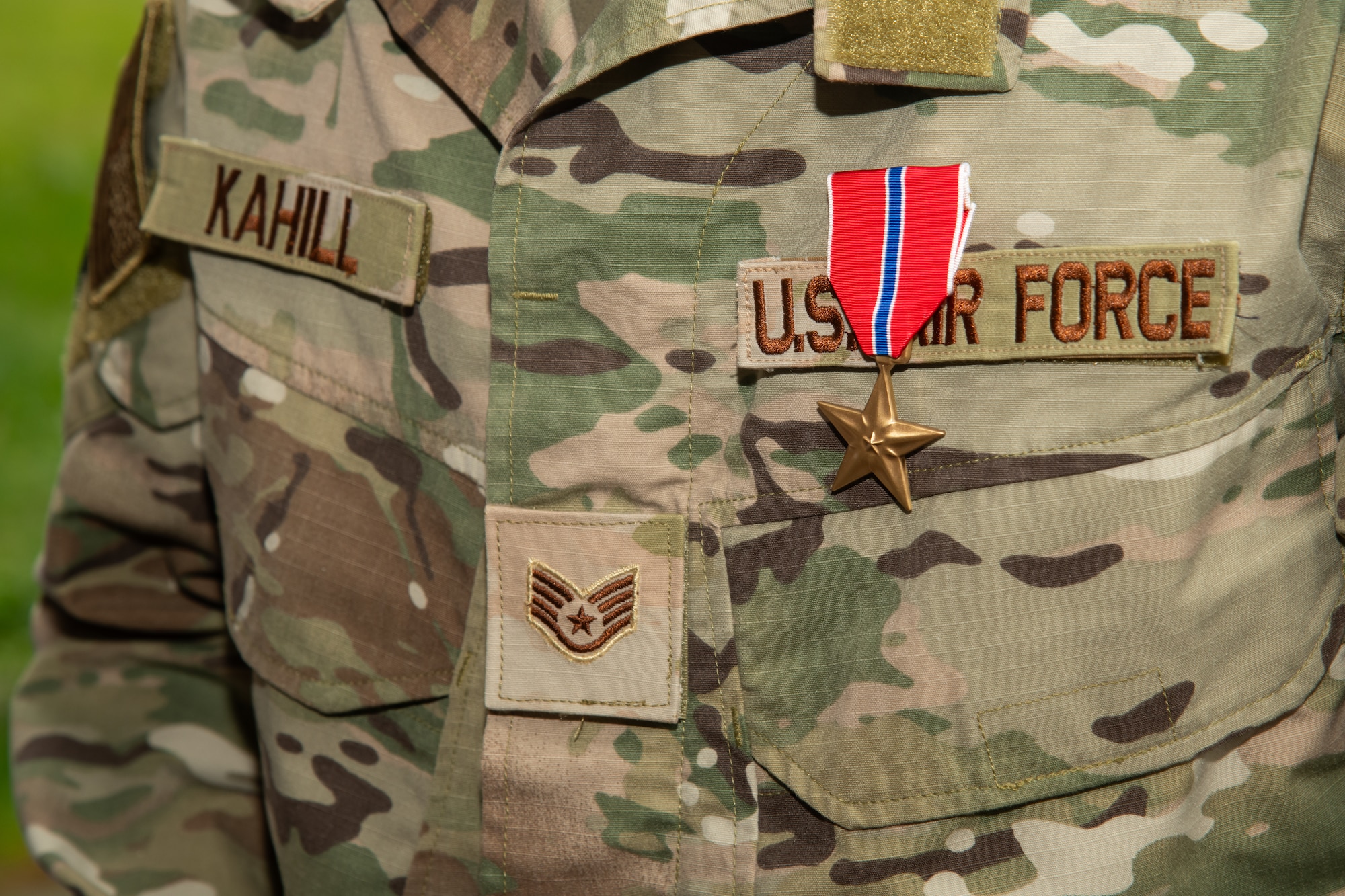 U.S. Air Force Staff Sgt. Justin Kahill, 227th Joint Terminal Attack Controller, poses for a closeup of his Bronze Star Medal on his uniform at the 177th Fighter Wing, Egg Harbor Township, New Jersey, May 4, 2025. Kahill was awarded the Bronze Star Medal for his meritorious service in a combat zone from March 2024 to Nov. 2024.