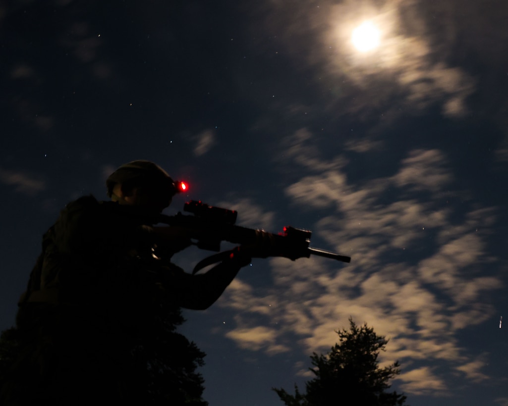 U.S. Marine Corps Lance Cpl. Austin G. Pfaff, a rifleman with Bravo Company, Marine Barracks Washington, maneuvers during a night fire-team attack drill at Marine Corps Base Quantico, Virginia, May 6, 2025. Conducted as part of a two-day training evolution, the exercise focused on building proficiency in small unit tactics under limited visibility, reinforcing critical infantry skills such as communication, target identification, and tactical movement. MBW Marines balance their ceremonial commitments with combat training to uphold the highest standards of military excellence and effectiveness.