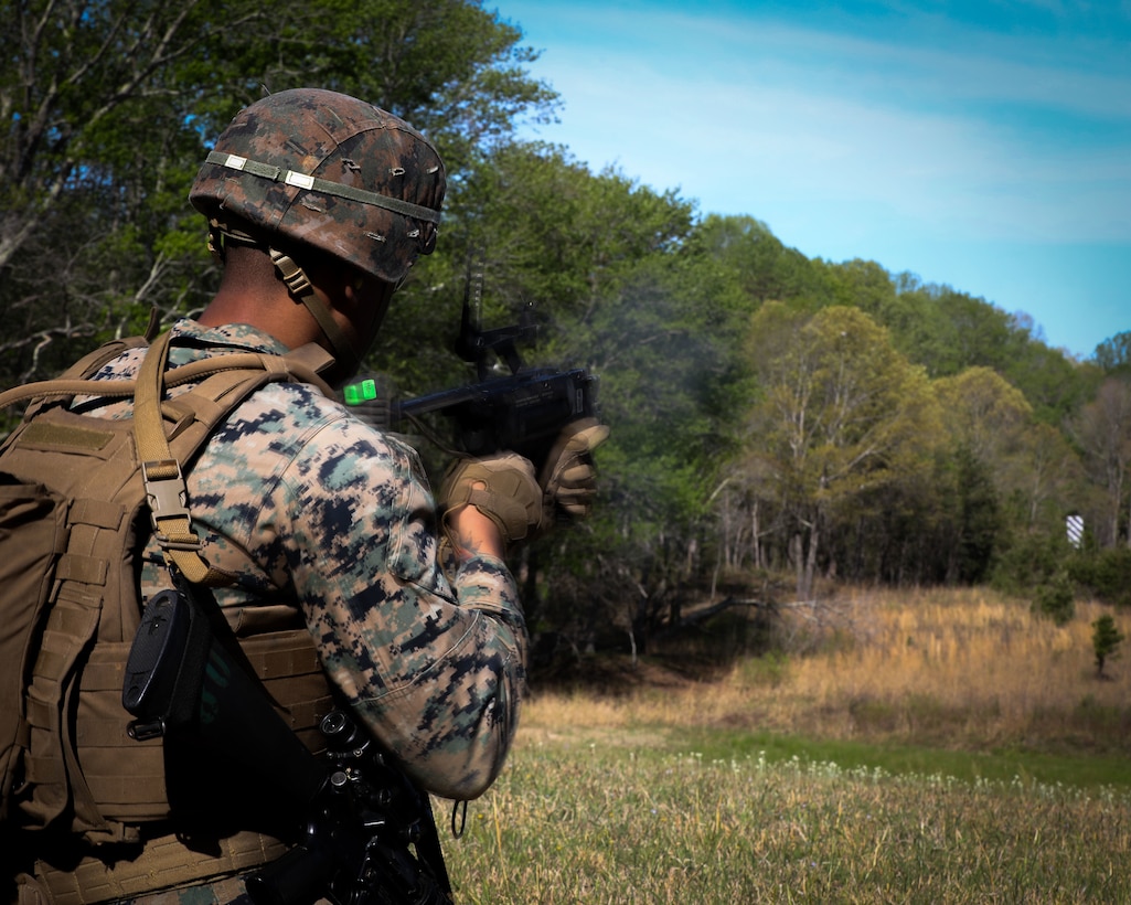 U.S. Marine Corps Lance Cpl. Trae Hornsveld, a rifleman with Bravo Company, Marine Barracks Washington, D.C., fires an M320 grenade launcher during a live-fire training exercise at Marine Corps Base Quantico, Virginia, April 23, 2025. The training focused on enhancing marksmanship, weapon familiarity, and combat readiness in a dynamic field environment. 8th & I Marines routinely conduct rigorous training to maintain the highest standards of precision, discipline, and combat effectiveness in support of ceremonial and operational missions.