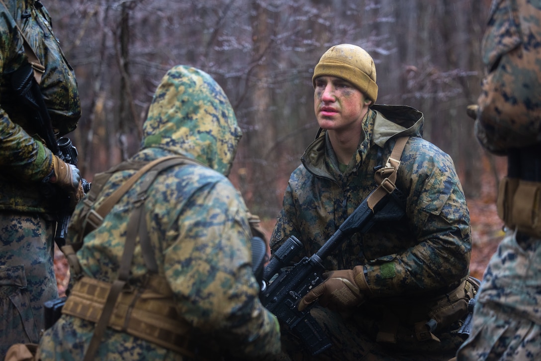 U.S. Marines with Bravo Company, Marine Barracks Washington, plan their next maneuver during a reconnaissance patrol as part of the Tactical Small Unit Leaders Course (TSULC) at Marine Corps Base Quantico, Va., Feb. 5, 2025. TSULC aims to train fire-team and squad leaders at Marine Barracks Washington while also standardizing small unit leadership practices across the battalion.