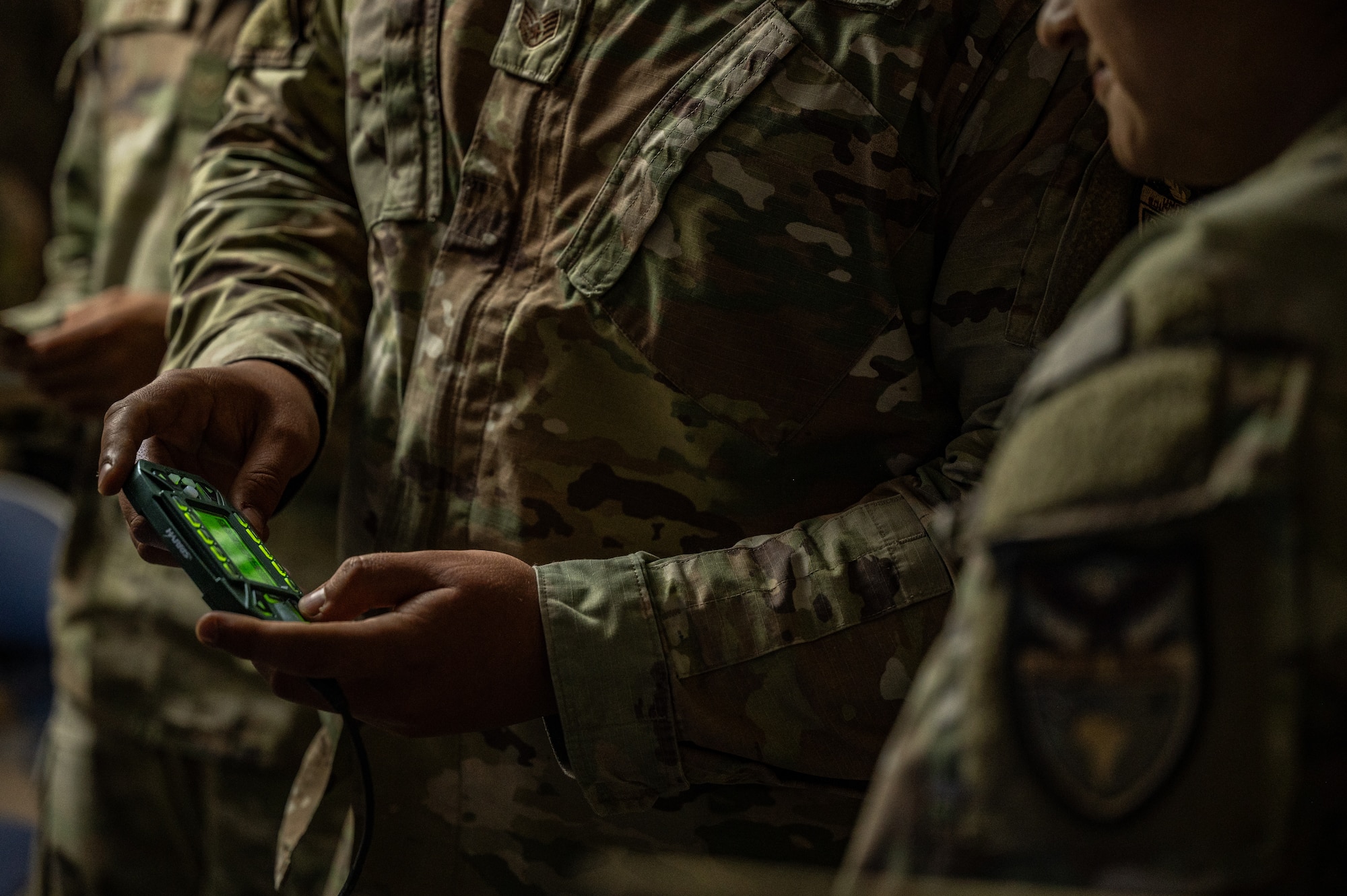 U.S. Airmen assigned to the 612th Air Operations Center (AOC) and 612th Air Communications Squadron conduct maintenance on command and control (C2) equipment during a mock deployment at Nellis Air Force Base, Nevada, May 13, 2025. The 612th AOC provides C2 of air power within the United States Southern Command's area of responsibility, which encompasses 31 countries and covers one-sixth of the world's land mass. (U.S. Air Force photo by Airman 1st Class Jennifer Nesbitt)