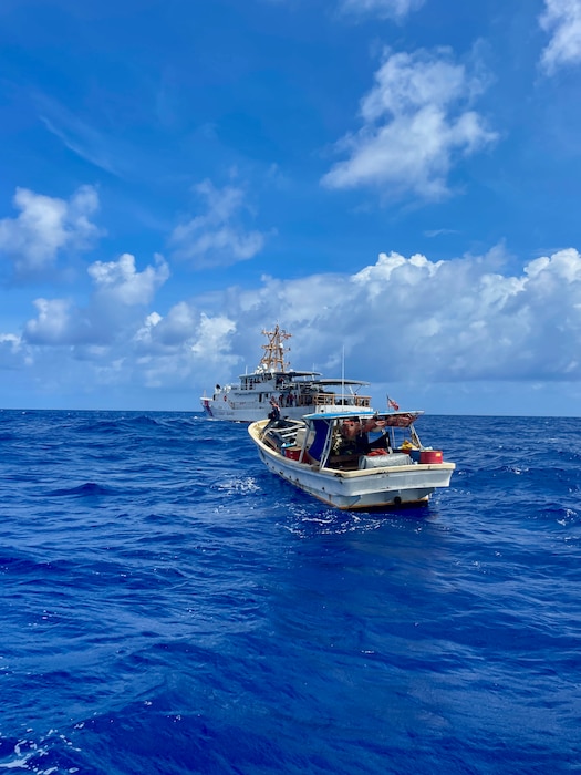The crew of the USCGC Myrtle Hazard (WPC 1139) arrive on scene with the 47-foot motor vessel Lucky Harvest adrift around 125 nautical miles west of Guam on May 16, 2025, and set up the tow.