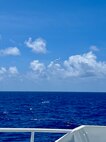 The crew of the USCGC Myrtle Hazard (WPC 1139) arrive on scene with the 47-foot motor vessel Lucky Harvest adrift around 125 nautical miles west of Guam on May 16, 2025.