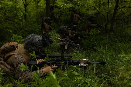 U.S. Marines with 2nd Battalion, 23rd Marines, forward deployed with 4th Marine Regiment, 3d Marine Division as part of the Unit Deployment Program, set security for U.S. Army Soldiers with the 23rd Chemical Battalion during joint chemical, biological, radiological, and nuclear defense training during Korea Viper 25.4 at Camp Stanley, South Korea, May 20, 2025.