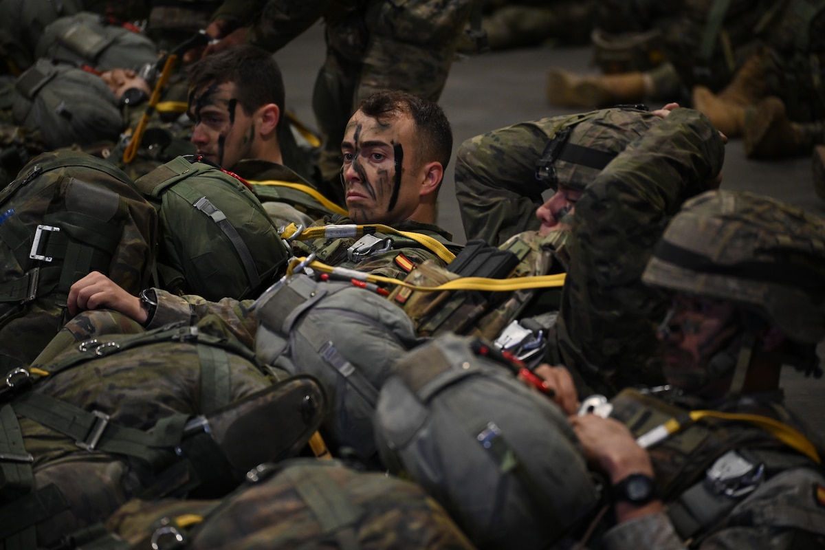 Spanish Army paratroopers wait for instructions during an exercise