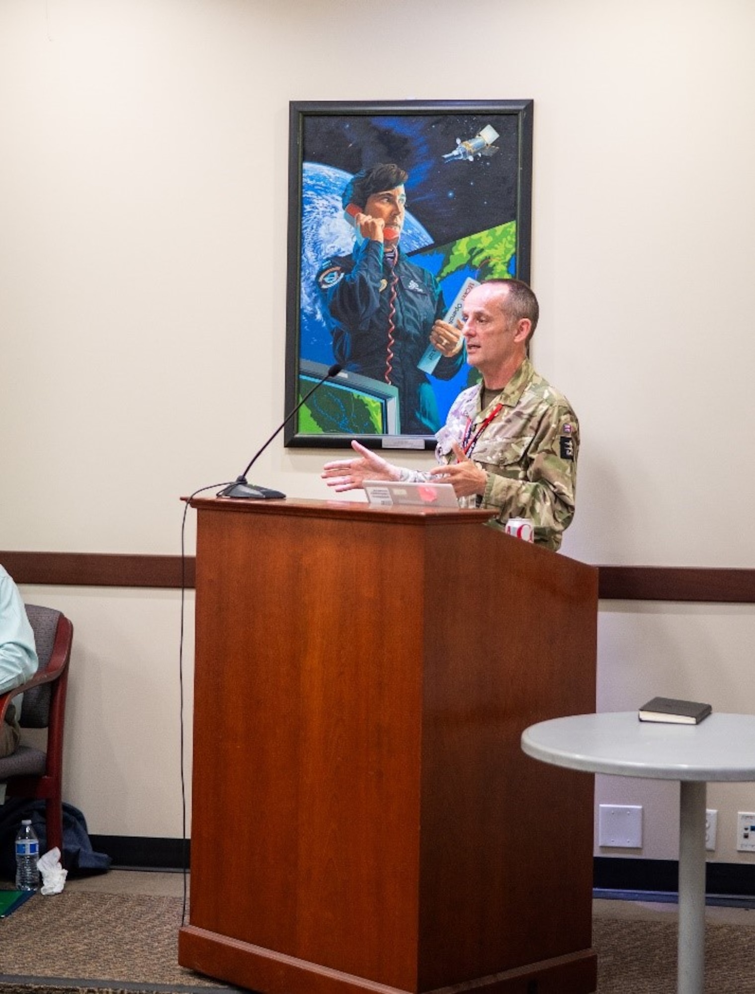 Wing Commander Gary Walker of the United Kingdom’s Royal Air Force presents at the 9th Allied SATCOM Future Architecture Working Group (FAWG) conference, May 5-7, 2025 at Space Systems Command. The bi-annual conference provides a forum for sharing Military SATCOM updates and advancing international collaboration.