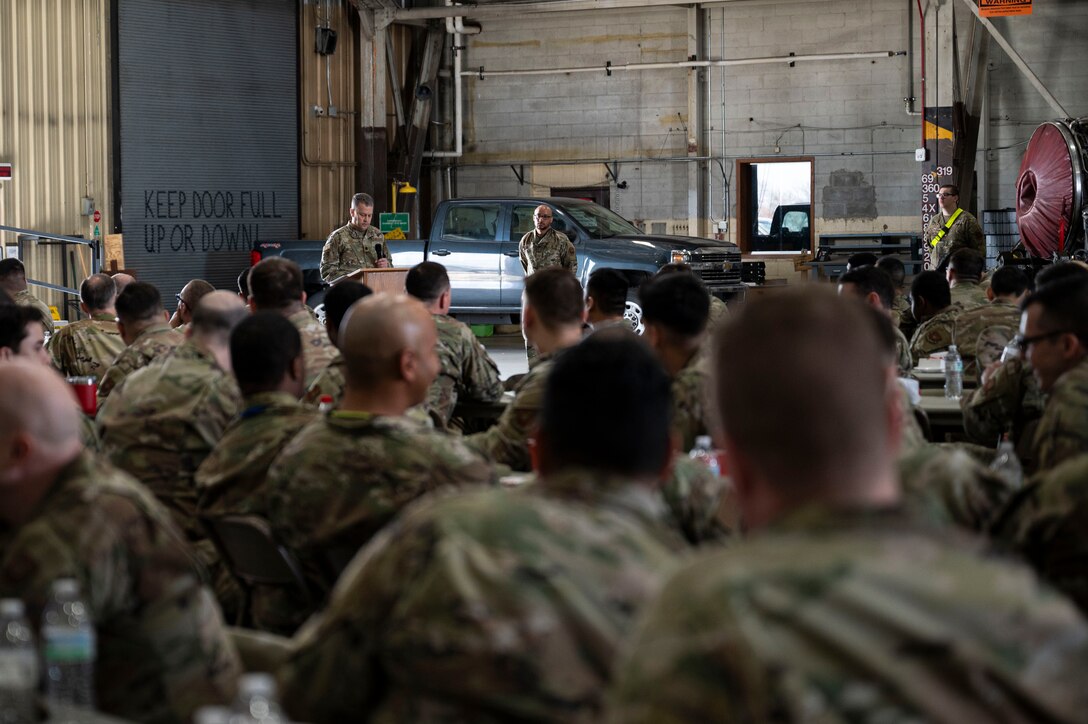 Lt. Col. Wilburn Poe, 28th Maintenance Group deputy commander, speaks to a crowd during the 28th MXG 2024 Maintenance Professional of the Year Awards ceremony at Grand Forks Air Force Base, N.D., April 25, 2025. The 28th MXG held a separate ceremony on Grand Forks AFB to celebrate the TDY airmen who were recognized as high performers. (U.S. Air Force photo by Airman 1st Class Emma Funderburk)