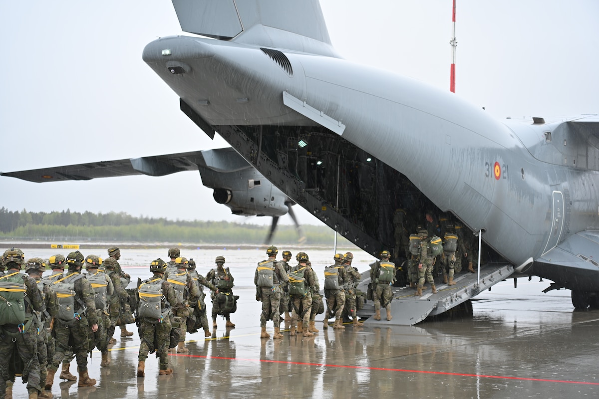 Spanish Army paratroopers board a cargo plane during an exercise