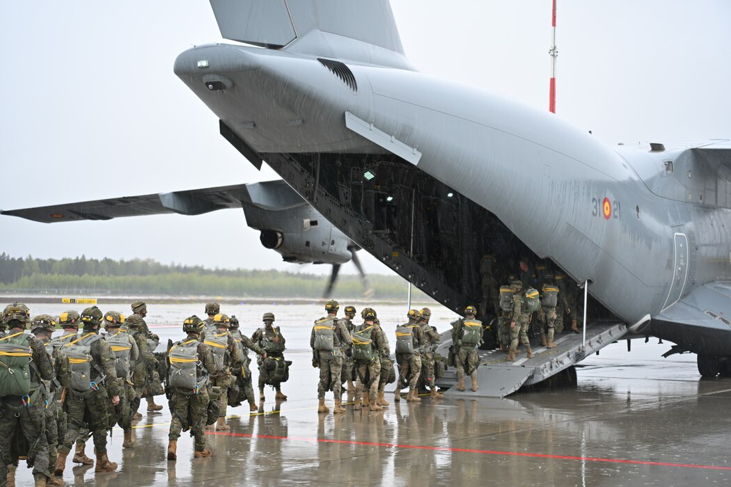 Spanish Army paratroopers board a cargo plane during an exercise