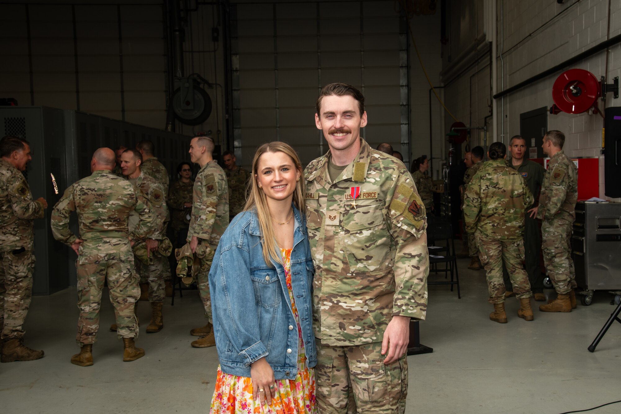 U.S. Air Force Staff Sgt. Justin Kahill, 227th Joint Terminal Attack Controller, poses for a picture with his girlfriend at the 177th Fighter Wing, Egg Harbor Township, New Jersey, May 4, 2025. Kahill was awarded the Bronze Star Medal for his meritorious service in a combat zone from March 2024 to Nov. 2024.