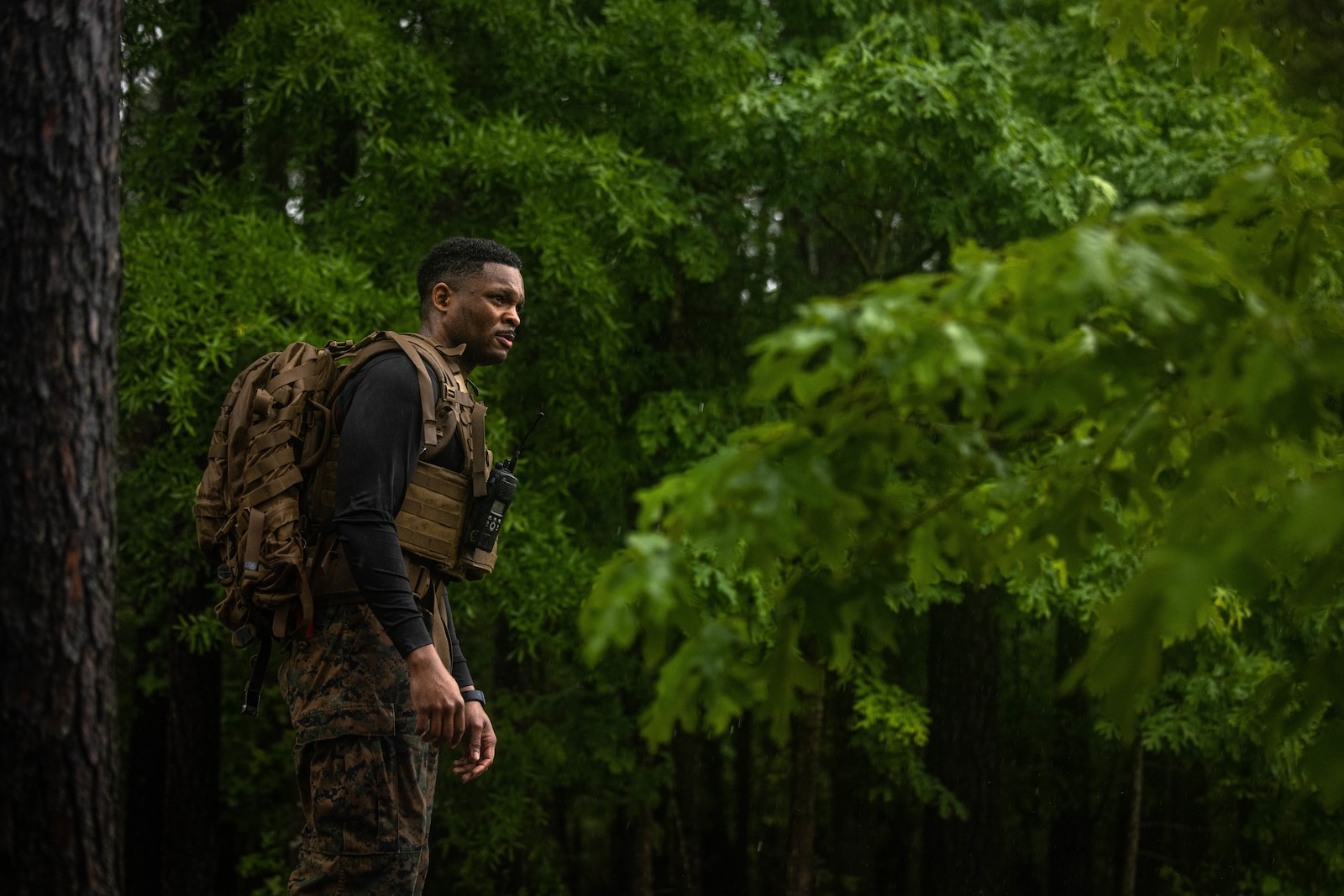 U.S. Marine Corps Staff Sgt. Frankie Cameron, a Martial Arts Instructor Trainer, with the MAIT Course 2-25, waits at a location point during a simulated casualty evacuation during the “Fighting Holes” training event at The Basic School on Marine Corps Base Quantico, May 13, 2025. Squads engaged head-to-head inside of fighting holes simulating close quarter combat while implementing techniques learned within the Marine Corps Martial Arts Program.
