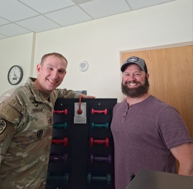 Sgt. 1st Class Jefrey Peters dropped by to see Physical Therapy Assistant Corey Ioerger at the Fort Riley SRU.