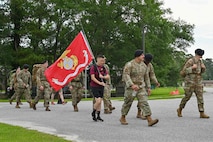 Participants take part in a 628th Security Forces Squadron Police Week ruck march.