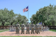 Joint Base Charleston leadership and Defenders from the 628th Security Forces Squadron attend the Police Week Retreat Ceremony.