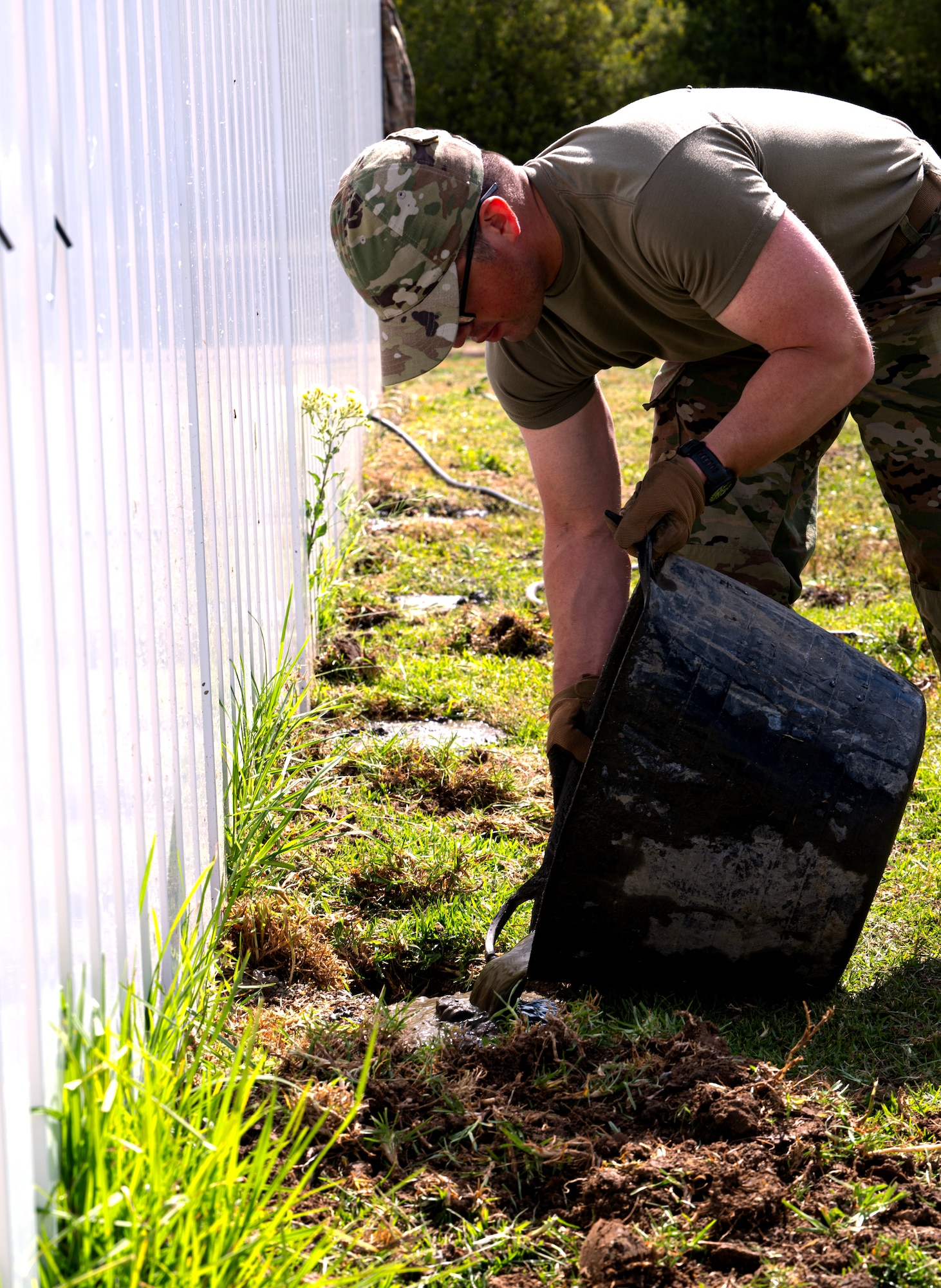 Senior Airman Alejandro Mendez, 446th Civil Engineer Squadron pest management, pours concrete at Moron Air Base, Spain, on May 6, 2025.