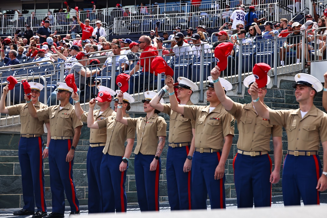 U.S. Marines from Marine Barracks Washington stand as they're recognized at the Washington Nationals game in Washington, D.C., May 7, 2025. The Washington Nationals recognize local military units throughout the Washington D.C. area through their "Salute to Service" program, offering servicemembers the opportunity to enjoy America’s pastime and interact with the community.