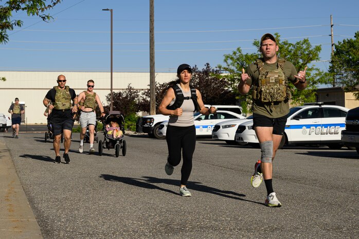 Members of Team Hill participate in a "Murph" workout at Hill Air Force Base, Utah, May 23, 2025. The "Murph" workout is commonly performed by military units, law enforcement agencies, and individuals around Memorial Day and throughout the year to honor the sacrifices of those who have served.  (U.S. Air Force photo by R. Nial Bradshaw)