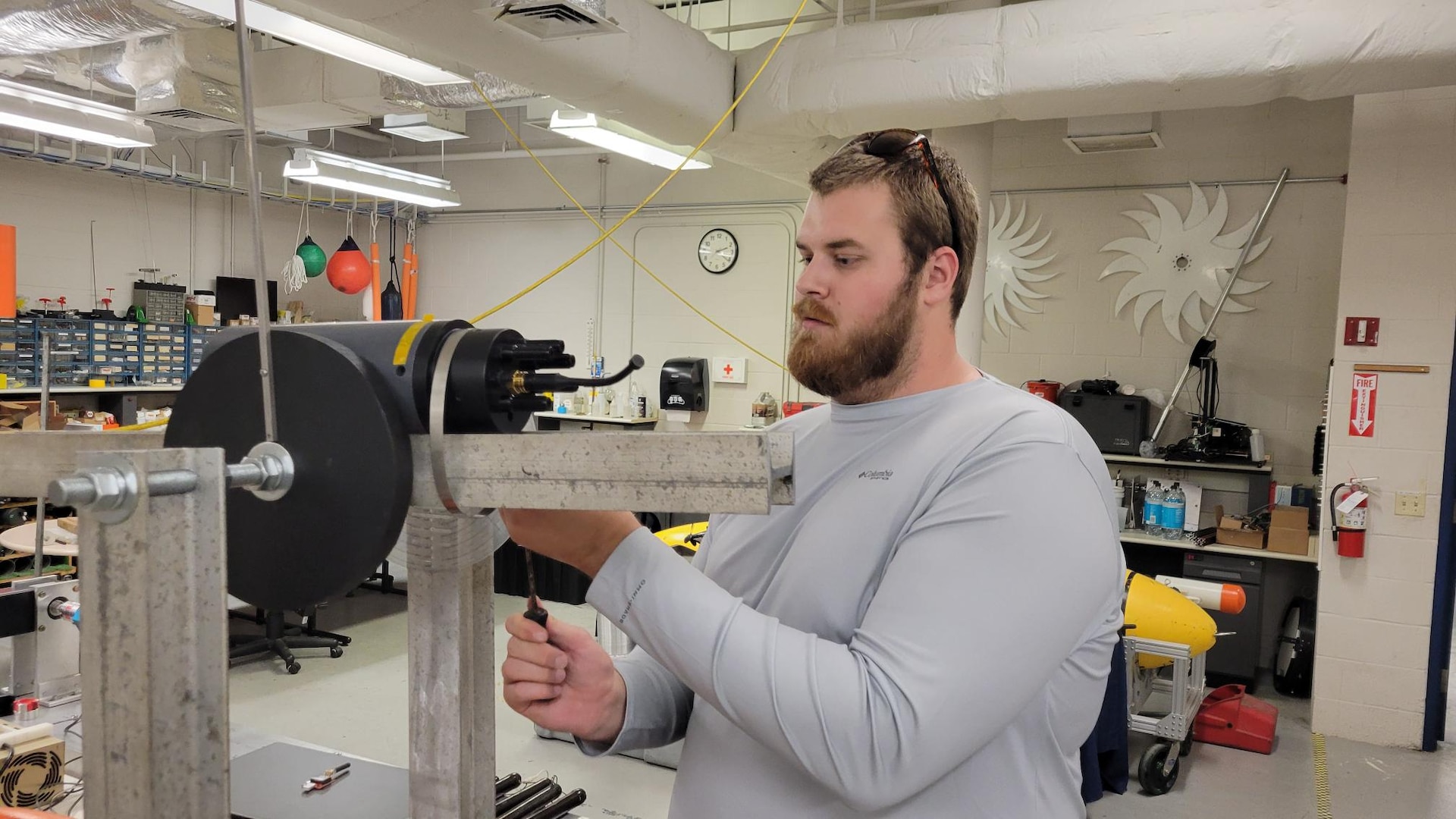 Garrett Flitton, (now) NSWC PCD engineer, tests an attitude sensing system he developed for a tow-fish based sensor package as a Naval Engineering Education Consortium (NEEC) program student at Florida Atlantic University, March 5, 2024. He is one of several FAU students who were hired at NSWC Panama City Division through the NEEC program. (courtesy photo)