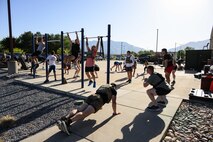 Members of Team Hill participate in a "Murph" workout at Hill Air Force Base, Utah, May 23, 2025. The "Murph" workout is commonly performed by military units, law enforcement agencies, and individuals around Memorial Day and throughout the year to honor the sacrifices of those who have served.  (U.S. Air Force photo by R. Nial Bradshaw)