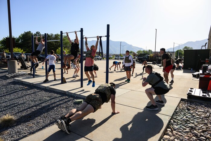 Members of Team Hill participate in a "Murph" workout at Hill Air Force Base, Utah, May 23, 2025. The "Murph" workout is commonly performed by military units, law enforcement agencies, and individuals around Memorial Day and throughout the year to honor the sacrifices of those who have served.  (U.S. Air Force photo by R. Nial Bradshaw)