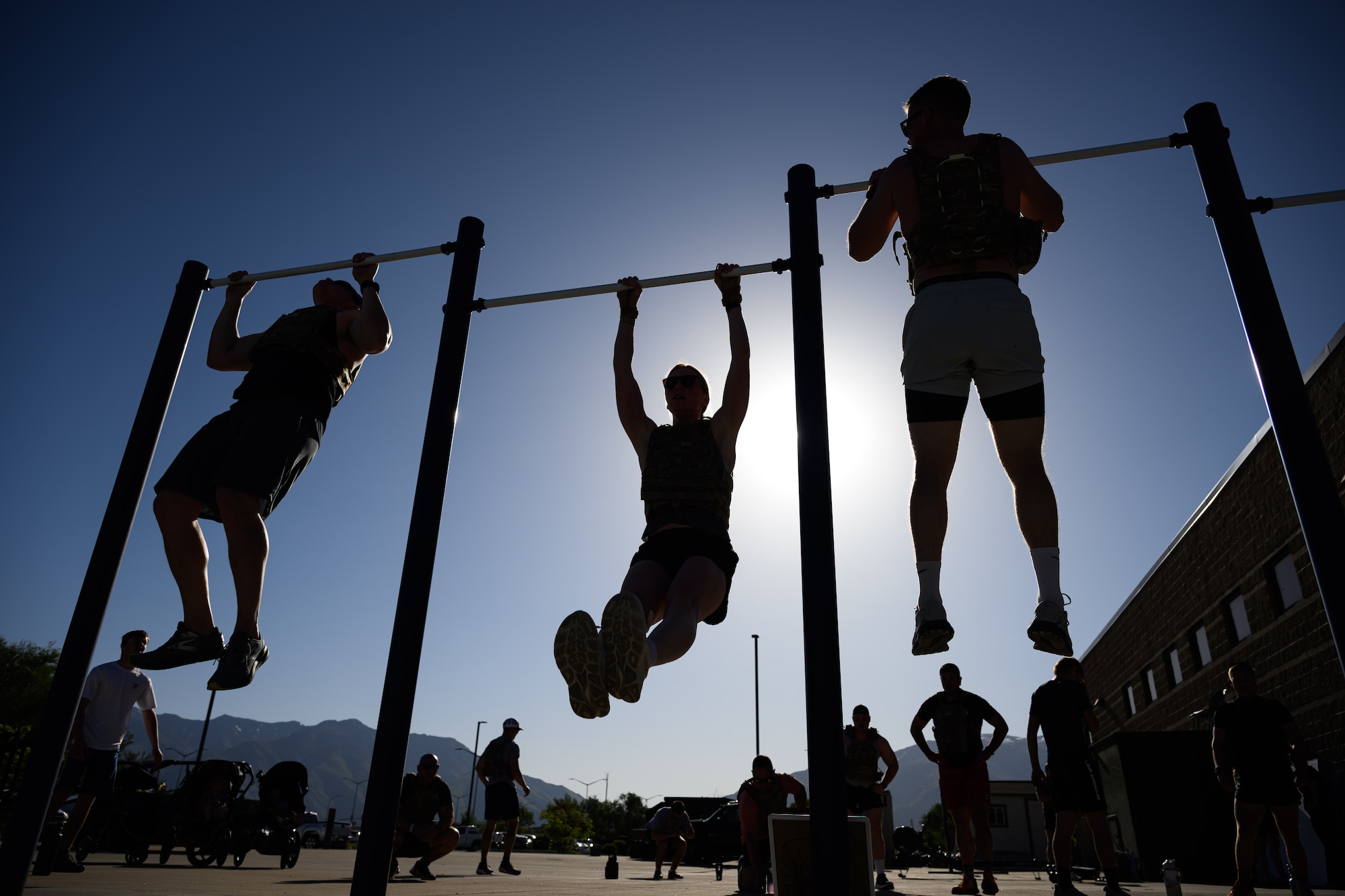 Members of Team Hill participate in a "Murph" workout at Hill Air Force Base, Utah, May 23, 2025. The "Murph" workout is commonly performed by military units, law enforcement agencies, and individuals around Memorial Day and throughout the year to honor the sacrifices of those who have served.  (U.S. Air Force photo by R. Nial Bradshaw)