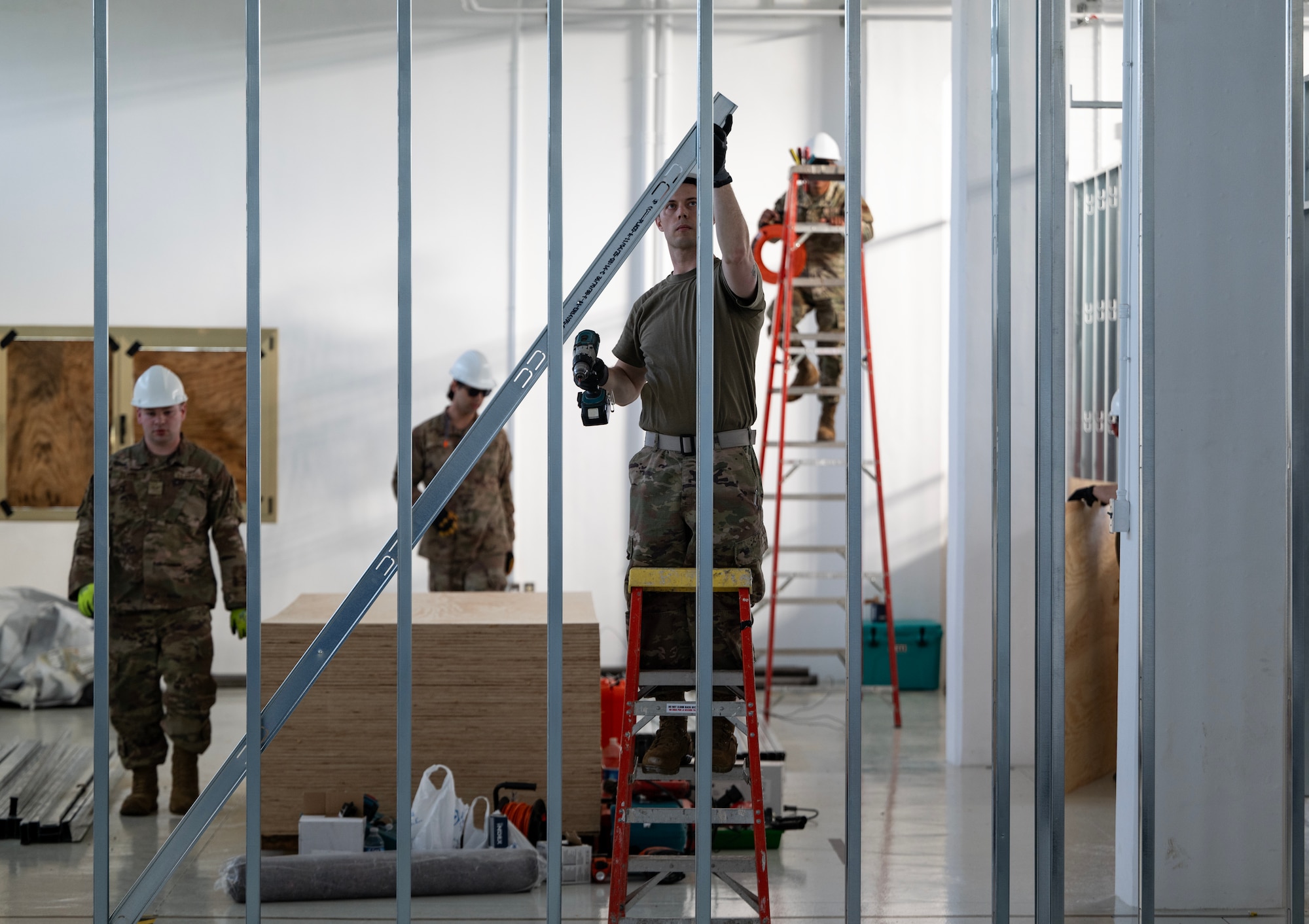 Airmen of the 446th Civil Engineer Squadron put together a dark room for the Security Forces team at Moron Air Base, Spain, on May 8, 2025.