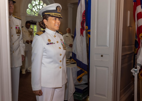 U.S. Navy Capt. Grace L. Key, outgoing commanding officer of Navy Medicine Readiness and Training Command Quantico, stands at attention during a change of command ceremony at Harry Lee Hall on Marine Corps Base Quantico, Virginia, May 22, 2025. During the ceremony Key was relieved by Capt. Brookes Williams, incoming commanding officer of NMRTCQ. (U.S. Marine Corps Photo by Lance Cpl. Harleigh Faulk)